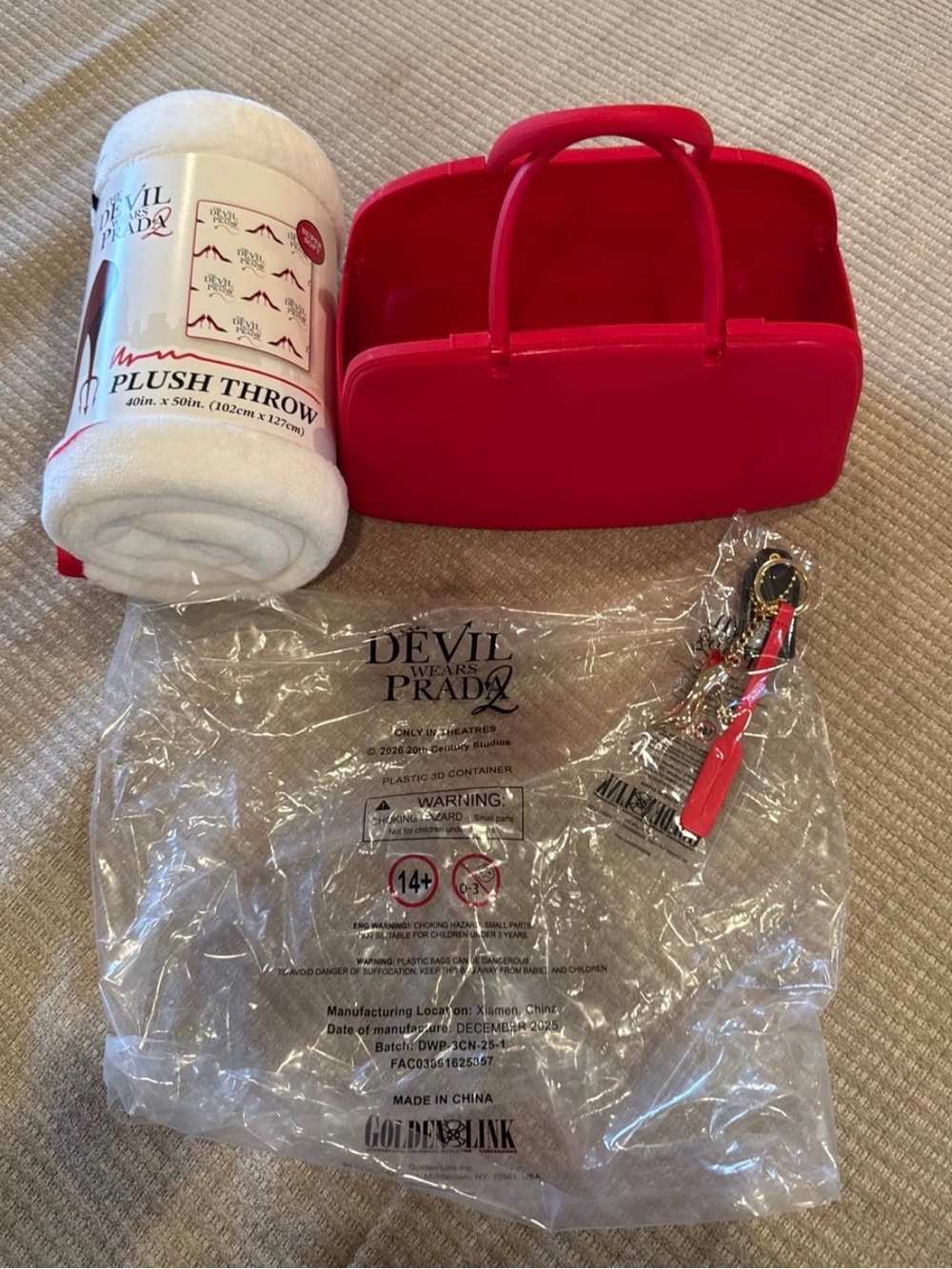 Devil wears Prada bag , keychain, and blanket